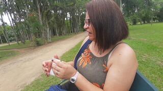 Annie sneezing on the park bench