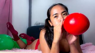 Sexy Stella Blows Up Then Pops Your Smaller Green And Red Christmas Balloons