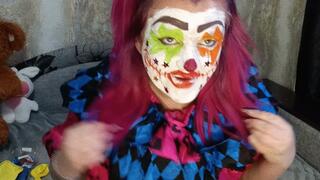 Val clown girl in gloves poping ballons