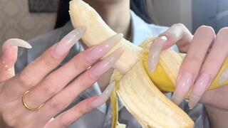 #127 - Long clear nails on banana