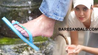 Pamela feet and flip flops getting wet under the fountain - 25012 HD