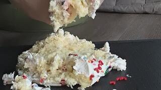 Christmas cake crushing with feet