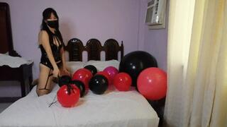 Dominatrix punishes balloons