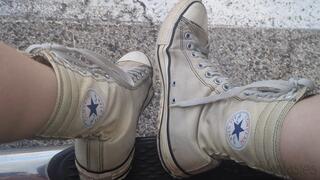 Fifi showing off her well worn ultra high top Converse All Stars from every angle replay