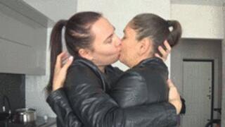 Lesbians sexy kiss and hug in leathers 2