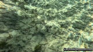 Carissa snorkling in the red catsuit in the public springs