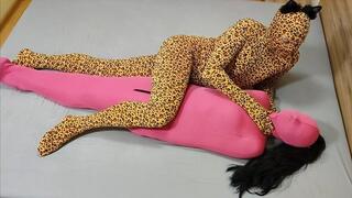 Mummified in pink bondage sack