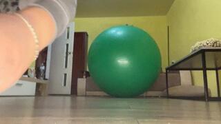 Val jumping on big green yogaball