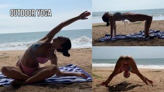 Hatha yoga and balance in bikini at the ocean