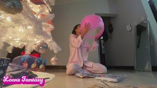 Akina plays with 3 beach balls in the middle of the night