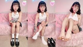 Cute, fit Asian girl shares her honest thoughts on foot fetishes while taking off her shoes and socks