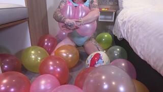 Tallulah's balloon popping fun