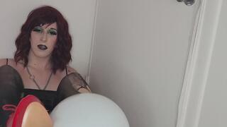 Little goth cutie in heels pops balloons