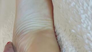 I caress my pretty feet sensually