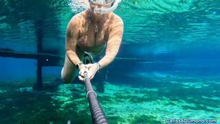 Carissa in a micro bikini snorkeling in the public spring