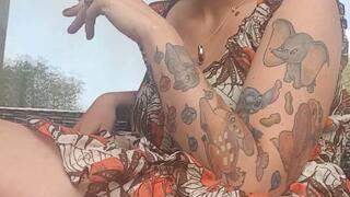 Smoking in a Summer Dress – Tattoos, Elegance & Sensuality