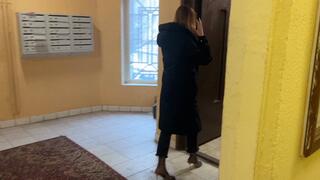 A girl in high-heeled shoes went out to the store and did not expect that the road would be so slippery