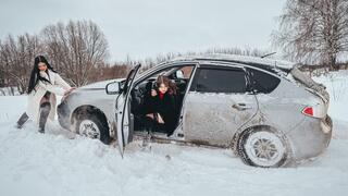 CAR STUCK Chris and Ellie get stuck in the snow in their 4WD Subaru