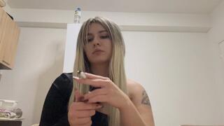 Smoking a cigarette while teasing you with my mouth''
