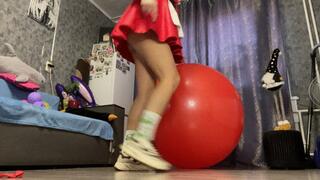 Val jump in dress on big red ball