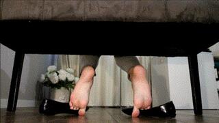 Shoe play , ballet flats gripped by the toes , wrinkled soles AVI