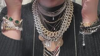 Anna Sparkle wearing full of jewerly while smoke multiples and cough