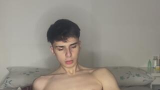 Laying down on my bed jerking off