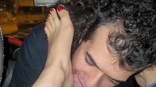 The taxi driver received Mistress White's payment by cleaning her feet