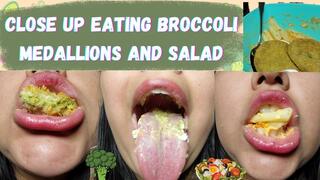 Close up eating broccoli medallions and salad