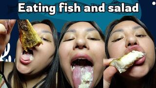 Eating fish and salad