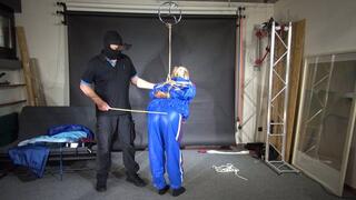 Ms Ungeniert bound, gagged and spanked in a shiny PVC Saunasuit
