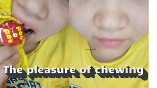 Enjoying the pleasure of chewing some chocolates