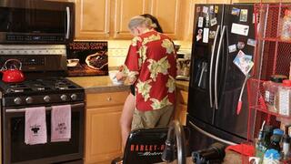 CARETAKER LONI LEGEN WITH THE OLD MAN IN THE KITCHEN