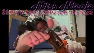 Slave's head between my toes