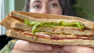 delicious sandwich and a glass of red m012