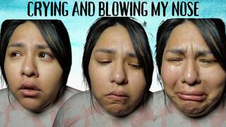 Crying and blowing my nose