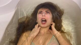 A girl is dipped under water by an unknown entity (custom video)