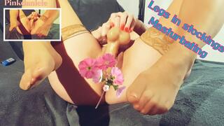 Legs in stockings, masturbating