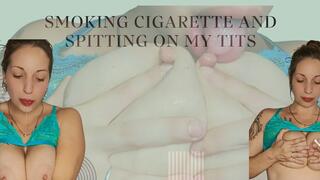 Smoking cigarette and spitting on my tits