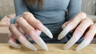 #192 - Long natural claws tapping table