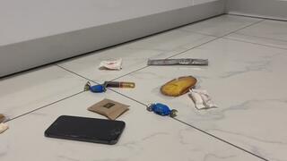 Marina crushes candy and a phone with her ballet shoes