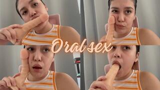 Oral sex to a dildo