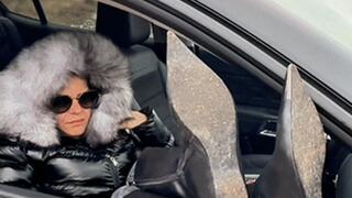 Sexy Mistress subdues her slave with her sexy boots and soles