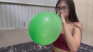 Blow to pop big balloon with Savannah
