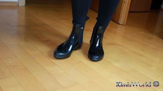 Rubber ankle boots and tan pantyhose