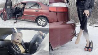 Anastasia does winter cranking, then warms her feet in exhaust fumes
