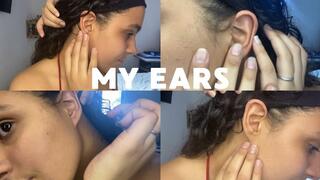 TOUCHING MY EARS