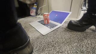 Cans crushed with New rock boots on mac book