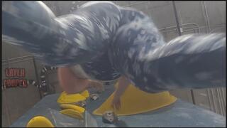 Giantess Layla climbs in blue snowflake leggings