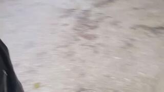 High heel leather boots in puddles